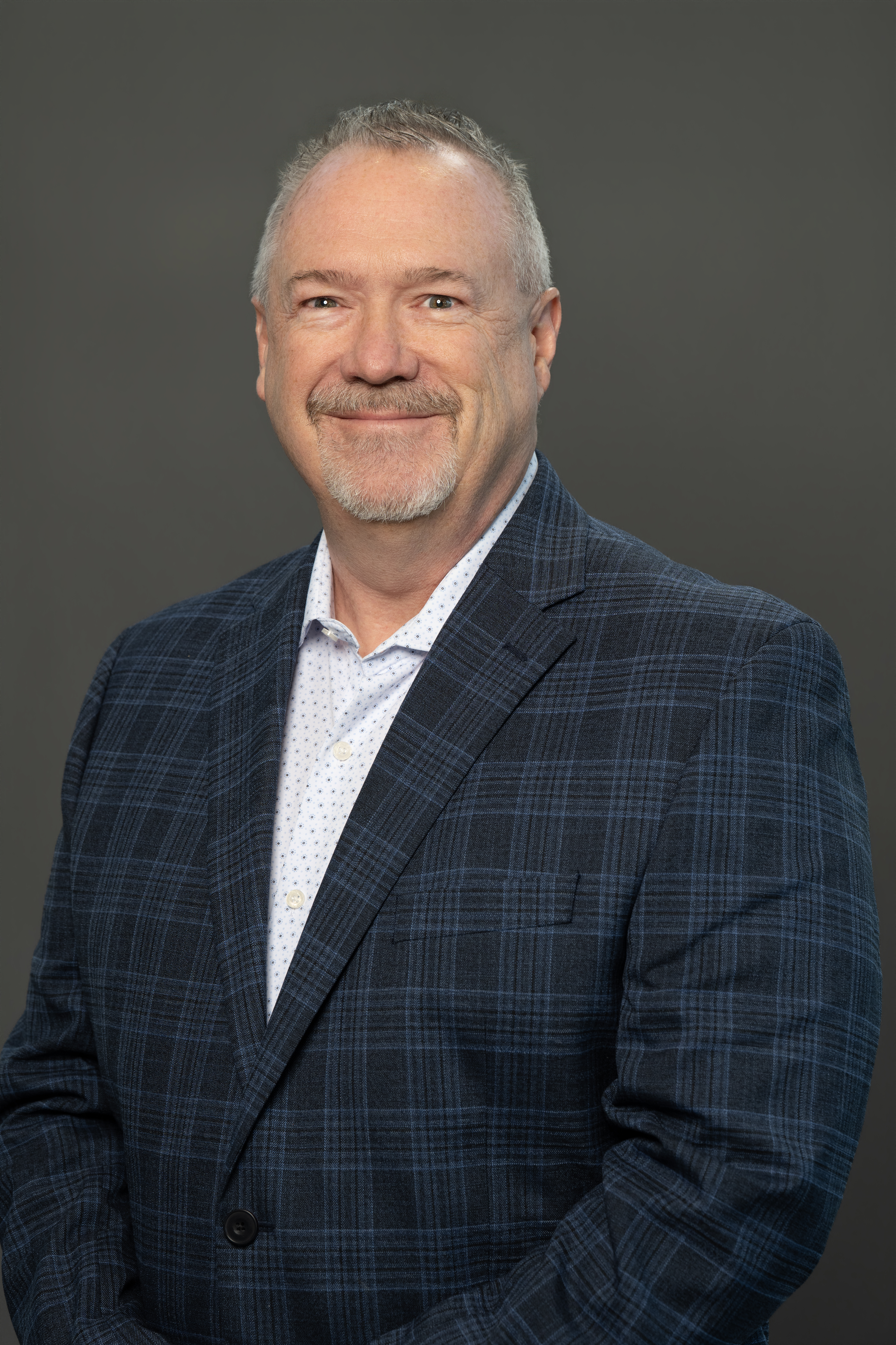 Gene Burcham, Systems Group Vice President